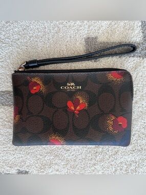 Coach Brown Signature Wristlet with Red Floral Print and Black Strap